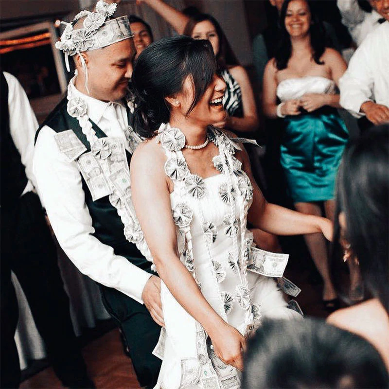 Couple doing Money Dance on the wedding day